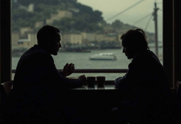 Couple in a cafe in silhouette